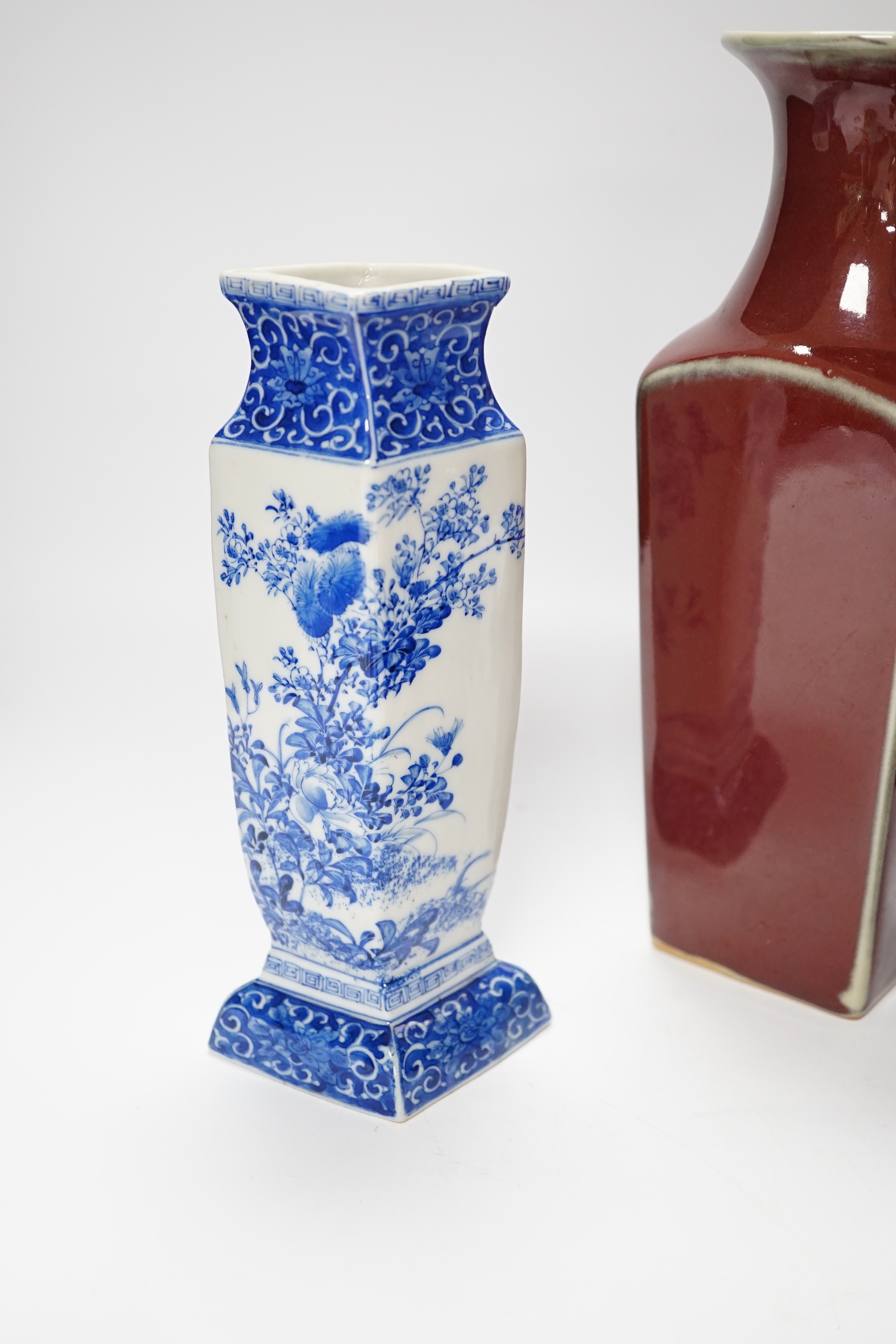 A Chinese sang-de-boeuf vase, a hongmu head, a Japanese Satsuma jar, a blue and white vase, and a turquoise and cream glazed vase etc, tallest sang-de-boeuf vase 25.5 cm high